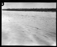 Los Angeles River flooded with torrential rain, [Compton?], 1927