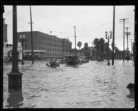 Rain-flooded intersection at Sixth and Catalina Streets, Los Angeles, 1927