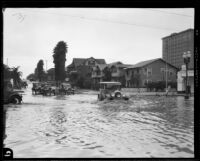 Rain-flooded intersection at Sixth and Catalina Streets, Los Angeles, 1927