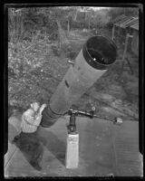 E. G. Richardson beside the telescope that he constructed for Whittier College, Whittier, 1947
