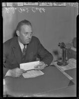 Captain S. J. McCaleb at his desk after his promotion to Chief of the Personnel Bureau, Los Angeles, 1938