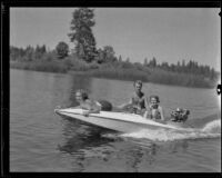 Jean Livingston, Ralph Wilson and Betty Bishonden riding a hydroplane boat, Lake Arrowhead, 1935