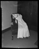 Dress draped over a chair in Gladys G. Fair's apartment, Long Beach, 1935