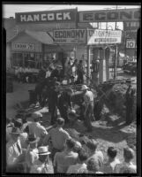 Workers retrieving Calvin Darling from a caved-in pit, Los Angeles, 1935