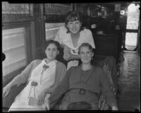 Deportees Ana Maria Gonzales, Soledad Zaragoza and Dorothy Barber in a railroad car, Los Angeles, 1935