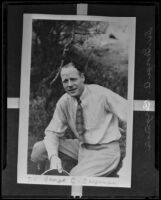 Dr. George C. Bergman seated in a landscape or garden, 1935 (copy photo)