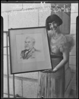 Orpha Klinker Carpenter happily holds her drawing of Charles Prudhomme, Los Angeles, 1935