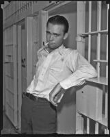 George Christensen smoking a cigarette in jail, Los Angeles, 1935