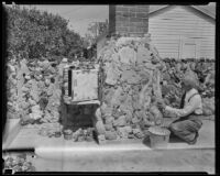 Lorenzo D. Smith works on his garden wall, Los Angeles, 1935