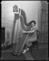 Esther Mendenhall playing a harp, Los Angeles, 1935