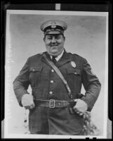 Man Mountain Dean, wrestler, in a police uniform, 1930s