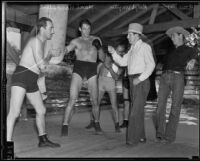Dr. Ralph Wagner, Hank Hankinson, Ernie Wagner, and unidentified men taking a break from extortion case, Santa Clarita, 1935
