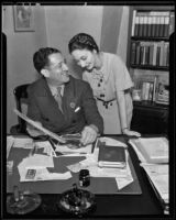 Walter and Hilda Herzburn in his office, Los Angeles, 1935