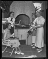 Mrs. Darling, Mrs. Toole, Mrs. Pearson, and Mrs. Daley at a garden grill party, Los Angeles, 1935