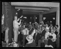 Auctioneer Dean S. Bedilion at a Public Administrator's auction, Los Angeles, 1935