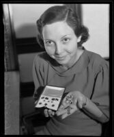 Dorothy Koerner holds the jewelry of the late Mr. and Mrs. Lew Cody and Mabel Normand, Long Beach, 1935