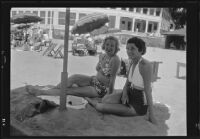 Actress Ruth Clifford on the beach with Mariann Flatau , Los Angeles, 1935