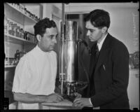 Dr. Robert Cornish, right, discussing revivification experiments with Dr. Ralph Willard, left, Los Angeles, 1935