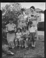 Part of the Talcott family reading outside: Betty, Frank, Rodney Jr., Tom, Marguerite, and Peggy, 1935