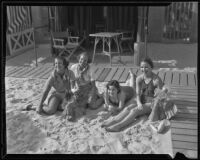 Betty Wood, Susan Carpenter, Helen James and Dorothy Sanders at the beach, Santa Monica, 1935