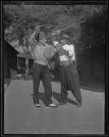 Andrew McKenna and Sam Abed sword fight for movie, Los Angeles,  1935