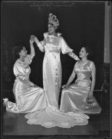 Carmen Gonzales, Sarah Rivera, and Maria Cruz dressed in gowns for EL Festejos Patrios Mexicanas, Los Angeles, 1935