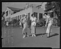 Three ladies golfing at the Wilshire Country Club, Los Angeles, 1935