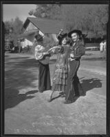 Alberti Corral, Adriana Galvez, and William Gill rehearsing for Mexican independence commemoration festival, 1935