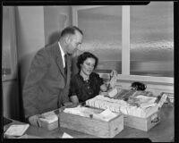 Marvin Hostler and Maudine Creason, choosing workers for W.P.A. projects, 1935
