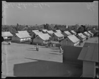 Eastman Grammar School, children and teachers mingle outside tented classrooms, Los Angeles, 1935