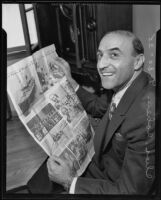 Charles Cohen, survivor of Florida hurricane reading newspaper reports about the steamer he was rescued from, Los Angeles, 1935