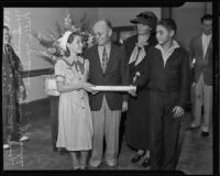 Leon R. Yankwich, Helen, Ilyana, and Peter Yankwich attend Judge Yankwich's swearing in ceremony, Los Angeles County, 1935