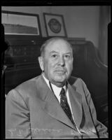 S.T. Bledsoe, President of Santa Fe Railway visiting Los Angeles to check on Union Station project, Los Angeles, 1935