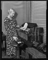 Betty Jones examining casting cards, Los Angeles, 1935