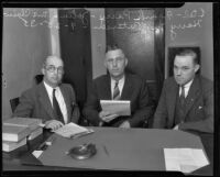 Frank Perry (left), Redondo Beach City Attorney, John L. McClain (center), Mayor of Redondo Beach, and Harry M. Petersen, Redondo Beach Chief of Police, witnesses in a gambling case, Redondo Beach, 1935