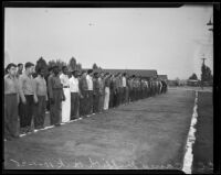 Young men at the C. C. C. camp in Griffith Park waiting to greet President Roosevelt, Los Angeles, 1935