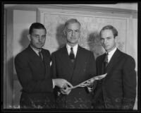 Lieutenant Colonel Earl North, Lieutenant Colonel Donald H. Connolly, and Lieutenant L. R. Wirak review paperwork for the WPA, Los Angeles, 1935