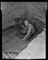 Charles Booth after digging up skeleton, El Monte, 1935