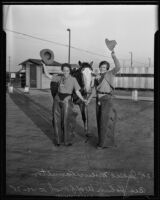 Jessie Moeur Hamilton and Bee Huhn Wofford pose with a horse, [California?], 1935