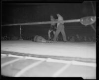"Butch" Rogers knocks down "Champ" Clark, Grand Olympic Auditorium, Los Angeles, 1935