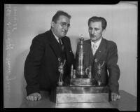 Two men and large chess trophy, Los Angeles, 1935