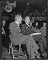 Rexford Tugwell and Byron Scott seated onstage at the Olympic Auditorium, Los Angeles, 1935