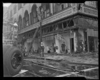 Ground-level view of Norton Building storefront in aftermath of fire, Los Angeles, 1935