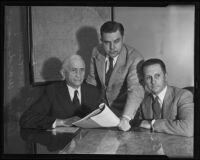 John A. Rush, Judge Robert Kenny and John Shirley Ward work on government reorganization, Los Angeles, 1935