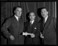 Gerald Fitzgerald, Tom May, and W. A. Holt raise money on behalf of the Community Chest, Los Angeles, 1935