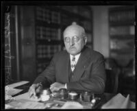 Judge Edward J. Henning at desk, Los Angeles, 1930-1935