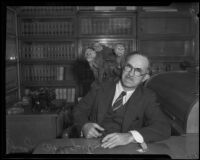 Judge Hollopeter with monkeys, Los Angeles, 1932