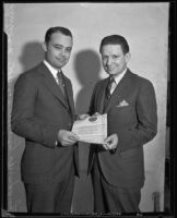 Harvey Humphrey presenting award to Durward Howes in the auditorium of the Southern California Edison Building, Los Angeles, 1932