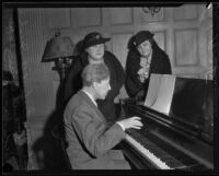 City society members Mrs. Leiland A. Irish and Mrs. Samuel C. Dunlap with Sid Grauman, Los Angeles, 1935