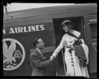 Mary Brian being greeted by brother Terry Danztler upon return at Grand Central Airport, Glendale, 1934
